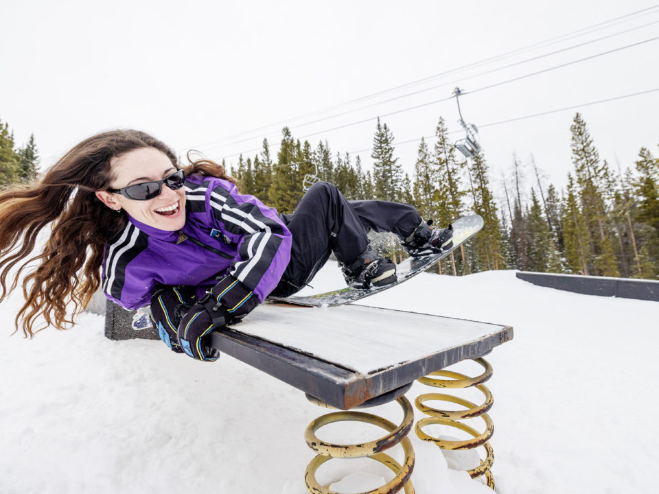 Maggie Leon slides across a feature at Copper Mountain.